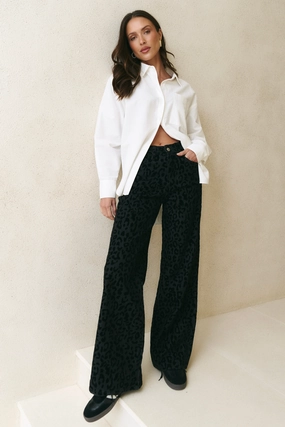 Layered Protection Belmont Black Animal Mid Rise Wide Leg Jean