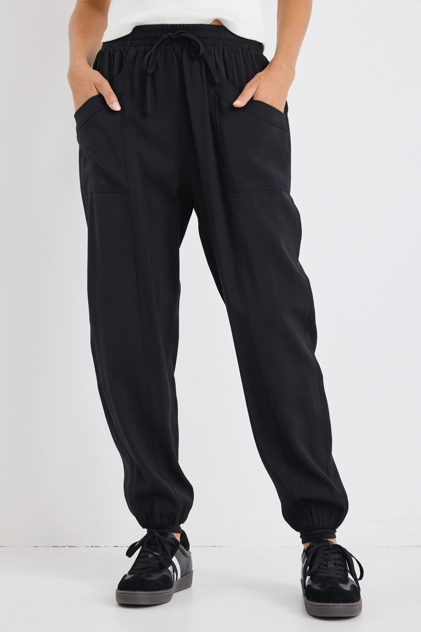 New Warrior Black Relaxed Drapey Drawstring Stretch Cuff Pant Versatile staple