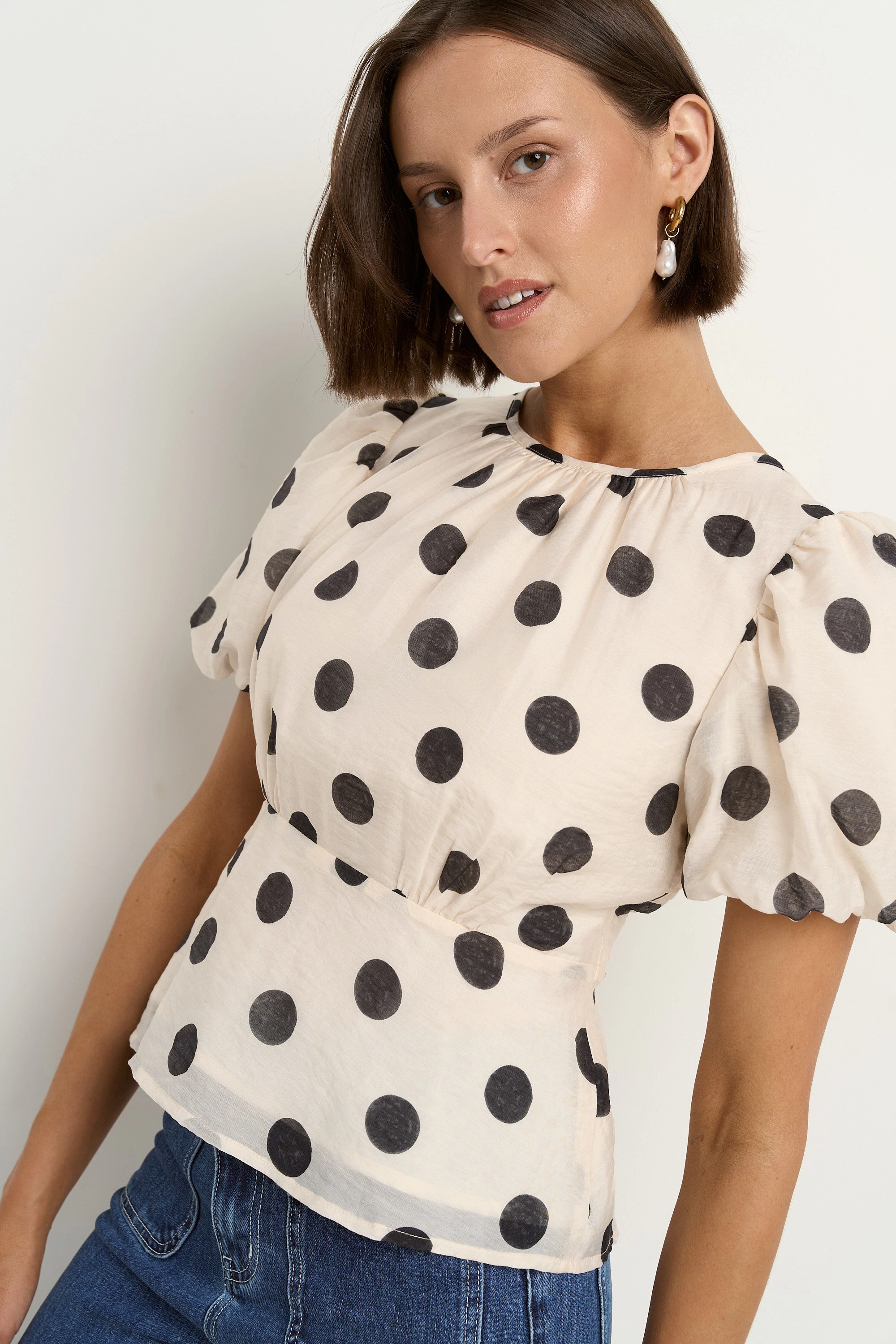NonRestrictiveSilhouette SweatWicking Fabric Finali Cream Black Polka Dot Puff Short Sleeve Top