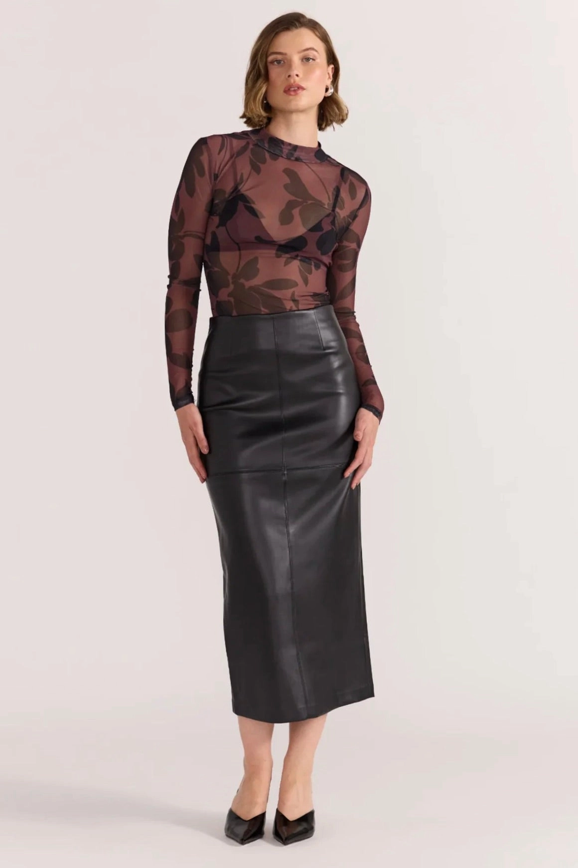 Cozy Vibes Gentle Flow Edie Black Faux Leather Midi Skirt