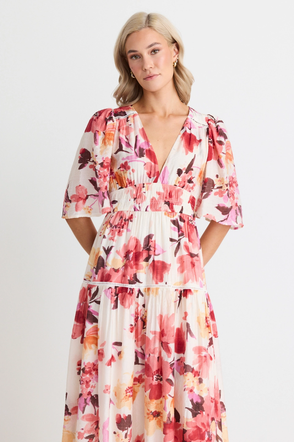 Fluent Vintage Blush Floral Flutter Sleeve Tiered Maxi Dress Pose Sweet