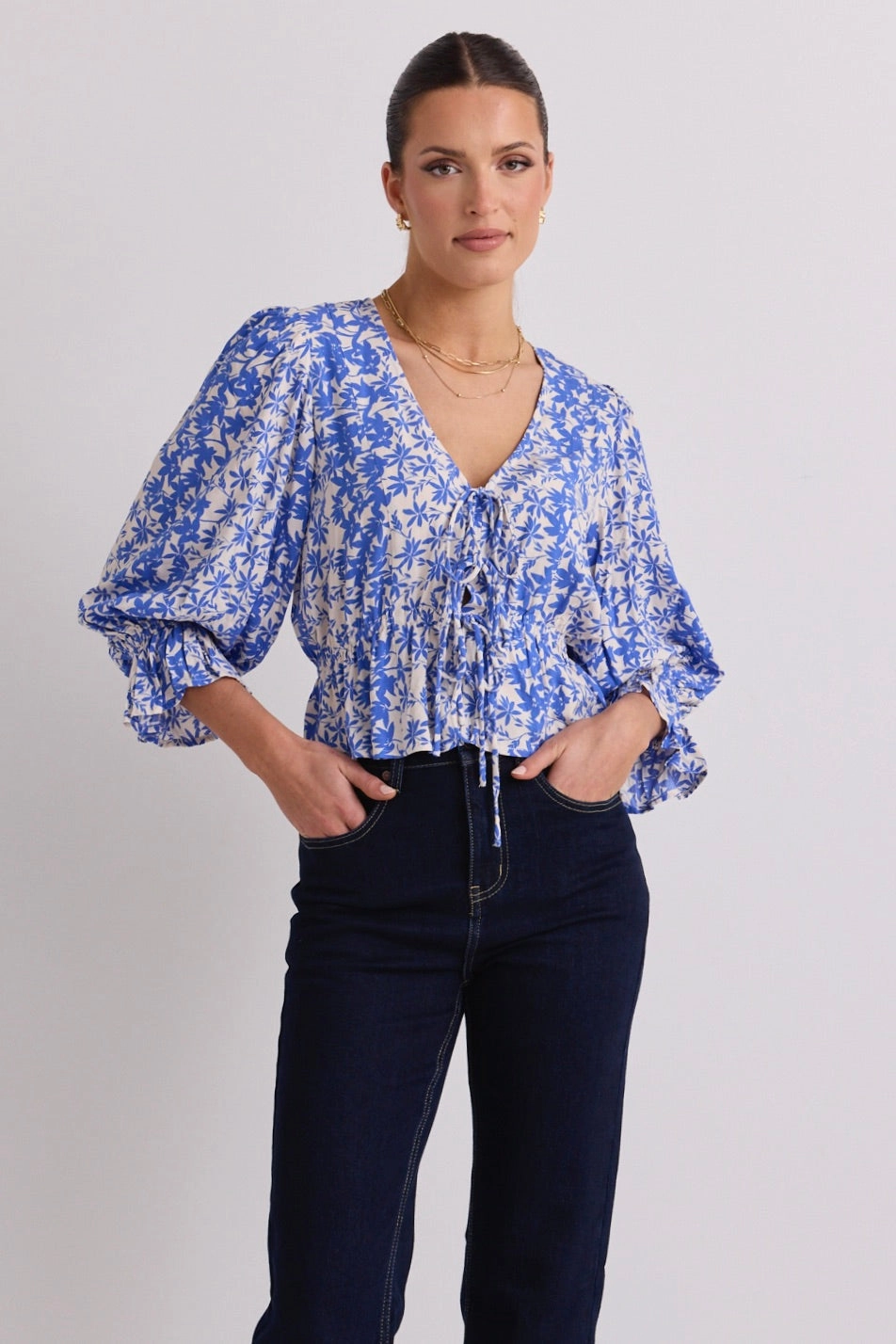 FlexibleElasticatedEdging LaserCut Edges Liberation Blue Floral Bow Front Short Sleeve Top